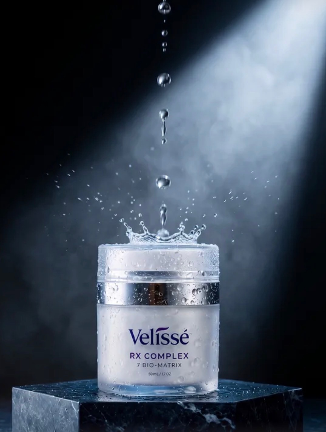 Velissé RX Complex with water droplets under spotlight